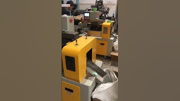 Empty small bottle manual loading feeding pillow type flow bag packaging machine factory video