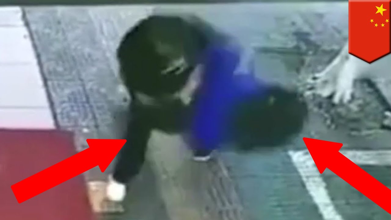 fake cop in china introduces student to sidewalk tomonews youtube