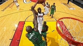 Dwyane Wade` s Acrobatic Hoop and Harm