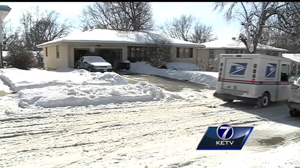 Snow presenting problems for postal carriers, homeowners