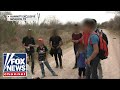 'Hannity' Exclusive: Journalist speaks with migrants as they cross US border