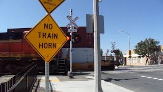 BNSF Stack Train Going West Meets BNSF Q-Train Going East Thru Riverside, CA USA 8/10/2019