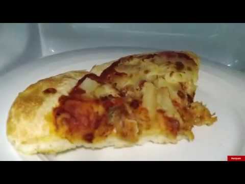 Video: Bagaimana untuk memanaskan semula pizza dalam ketuhar gelombang mikro