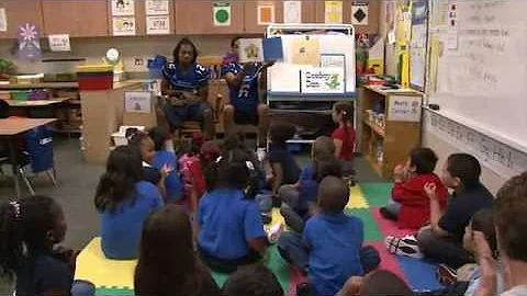 Spring ISD - Dekaney Football Team Reads to Students at Booker Elementary
