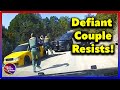 Deputy Tases Defiant Driver Twice & Arrests Passenger - Officer Gets Put On Leave!