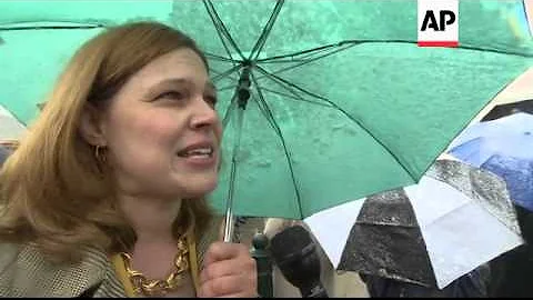 Defenders and protesters rally outside the Supreme Court as Justices tackle a case that allows busin