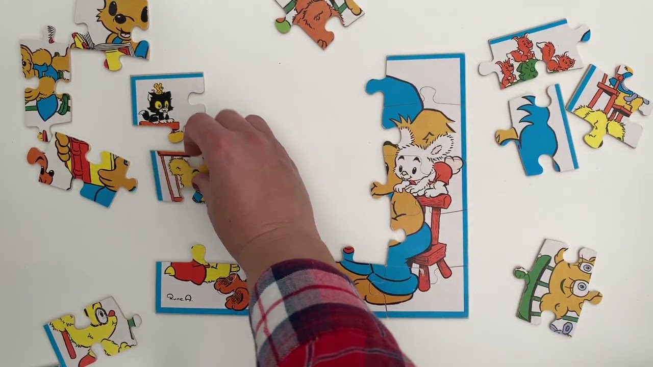 Bygg ett pussel med Bamse och hans barn med oss