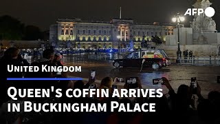 Crowds pay respects to Queen Elizabeth II as her coffin arrives at Buckingham Palace | AFP