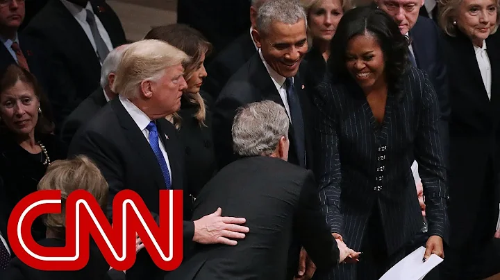 Michelle Obama, George W. Bush share warm moment a...
