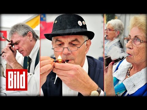 Video: Wie man eine Tabakpfeife raucht (mit Bildern)
