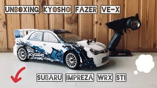 Unboxing KYOSHO Fazer VE-X Subaru Impreza - мощная тачка с б/к системой из коробки!