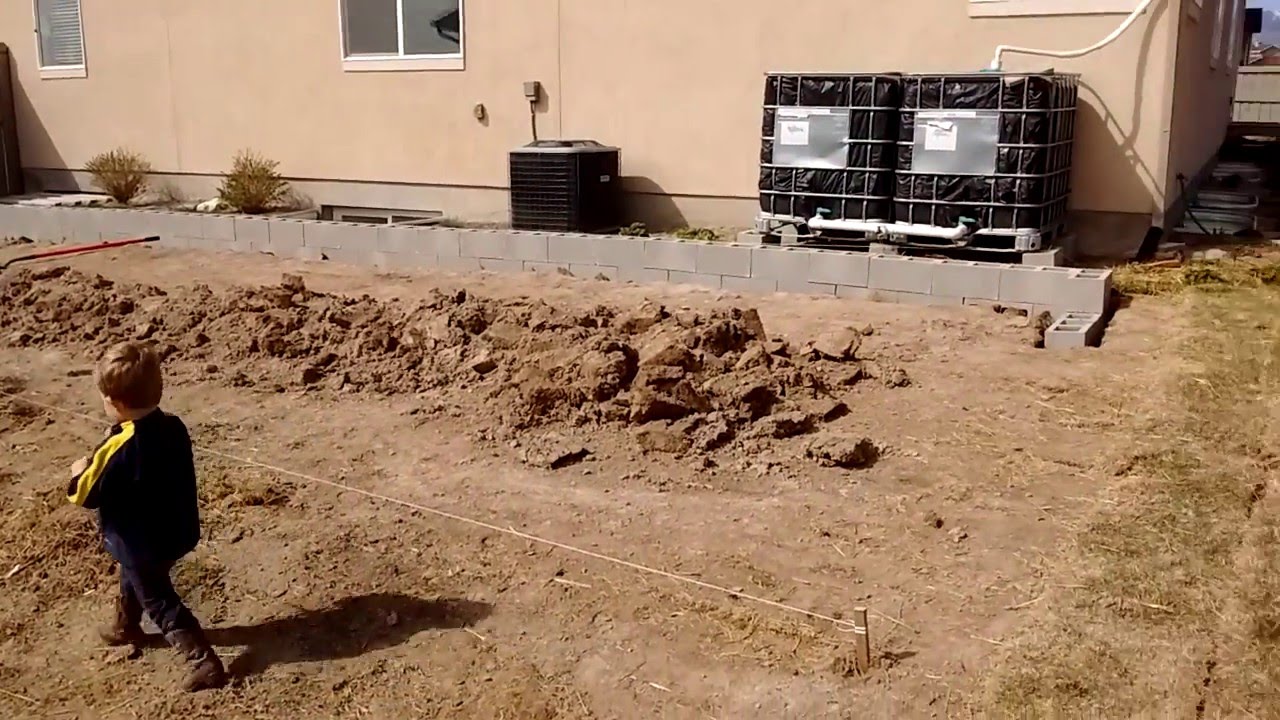 Cinder block berry patch construction - YouTube