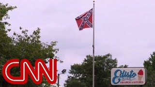 Shop owner can't remove Confederate flag