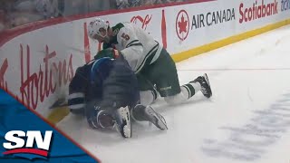 Jets' Stanley drops glove with Wild's Middleton after collision on Scheifele screenshot 3