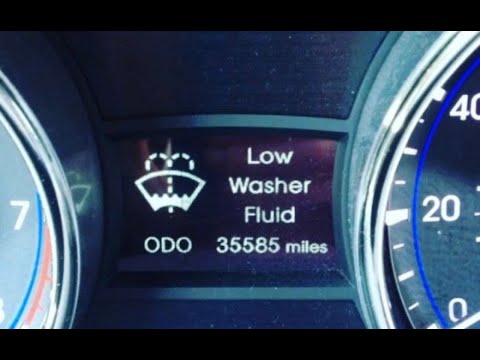 ¿Qué significa 'Low Washer Fluid'? ¿Por qué aparece en el tablero del auto?