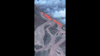 Lava seen flowing out of fissures on Mauna Loa