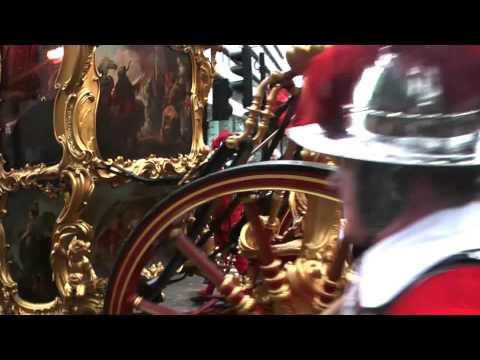 A very brief clip of the Lord Mayor of the City of London, Nick Anstee, leaving the Royal Courts of Justice having sworn allegiance to the Queen. Nick Anstee is the 682nd Lord Mayor of the City of London. The video clip shows a close up of the Lord Mayor's Coach - commissioned in 1757 at a cost of Â£1065.0s.3d. The coach is actually older, by a few years, than the State Coach used for coronations. The Italian artist Giovanni Cipriani painted the side panels of both coaches. The coach is drawn by six Waldburg Shire horses. In the coach are the Lord Mayor, his Chaplain, the Mace Bearer and the Sword Bearer. Behind the coach is a company of the Pikemen & Musketeers of the Honorable Artillery Company. The company was reformed in 1925 to act as a ceremonial body within the City of London. Its members are volunteers from the veterans of the Honorable Artillery Company and the uniforms and drill date from the time of Charles 1. The music here is provided by three tabors and two fifes playing La Mourisque (Moorish Dance), published in Antwerp in 1551 by Susato - although the tune is almost certainly older. In the background you can hear the bells of St Clement Danes church which is situated just outside the Royal Courts of Justice.