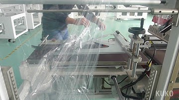 Film Installation---Automatic L bar seal shrink wrap machine.
