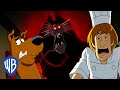 Scooby-Doo! in Italiano 🇮🇹 | Il Fantasma Rosso crea scompiglio! | WB Kids