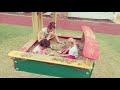 Playing in the sandbox with a friend