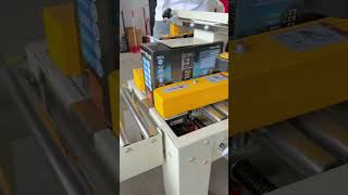 Packaging, sealing, and shipping label application for department store merchandise—all in one step