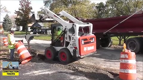 Bobcat Skid Steer Filling Curb And Backing Into Trailer | Skid Steer Loading
