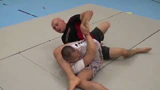 Reverse Triangle with Armbar & Americana options