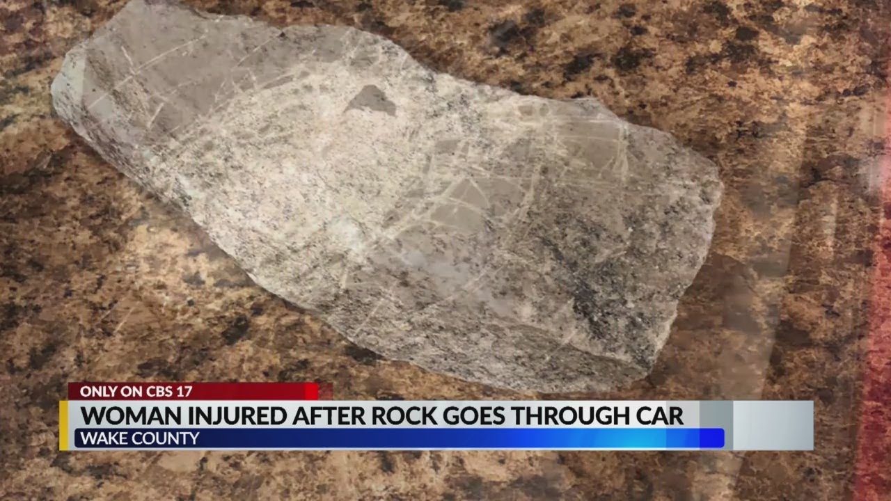 Woman says rock smashed through her windshield on I-440