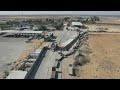 AERIALS: Lorries line up in Palestinian Rafah to collect aid delivered from Egypt | AFP