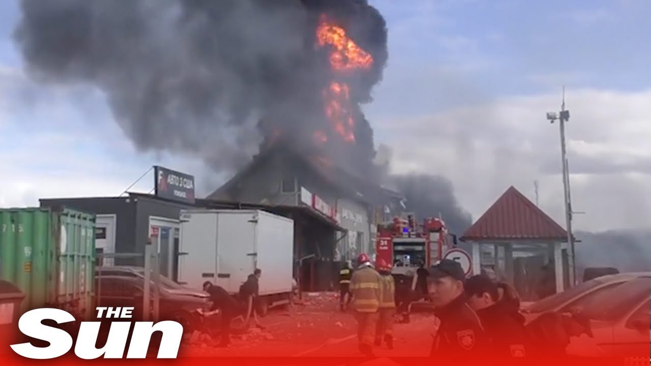 Firefighters battle huge blaze after deadly missile strikes in Lviv, Ukraine