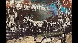 at the drive in | in-ter a-li-a