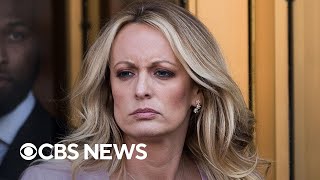 Trump watches as Stormy Daniels spars with defense in \\