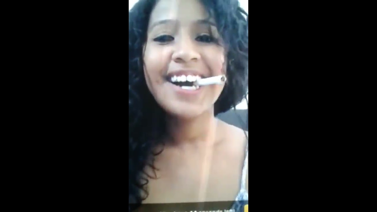 COLUMBIAN BRAT TEASING WITH A CIGARETTTE
