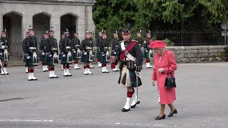 The Queen inspects the Royal Guard from 5 SCOTS outside Balmoral Castle in Scotland, August 2021