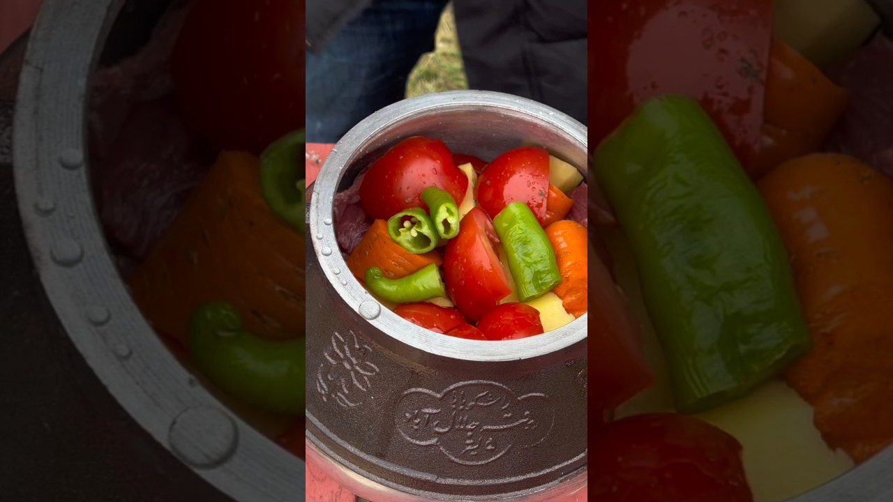 Vegetables and  beef cooked over the fire. Camping dinner.