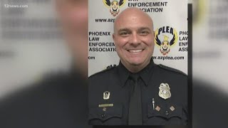 Former Phoenix police officer who punched a suspect in cuffs sentenced to probation