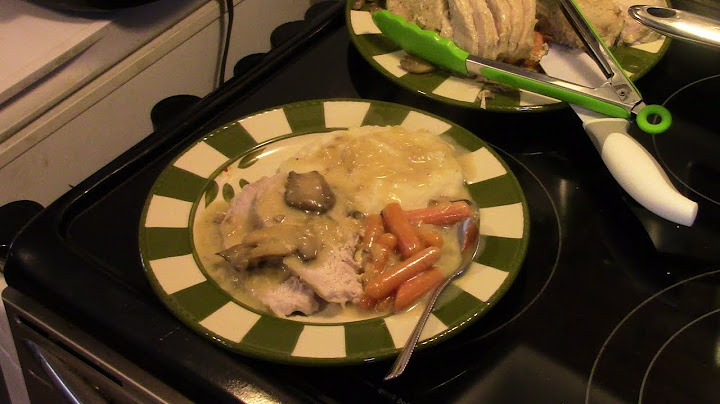Slow cooker pork roast with vegetables and cream of mushroom soup