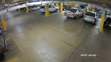 Car in Parking Garage - Security Camera