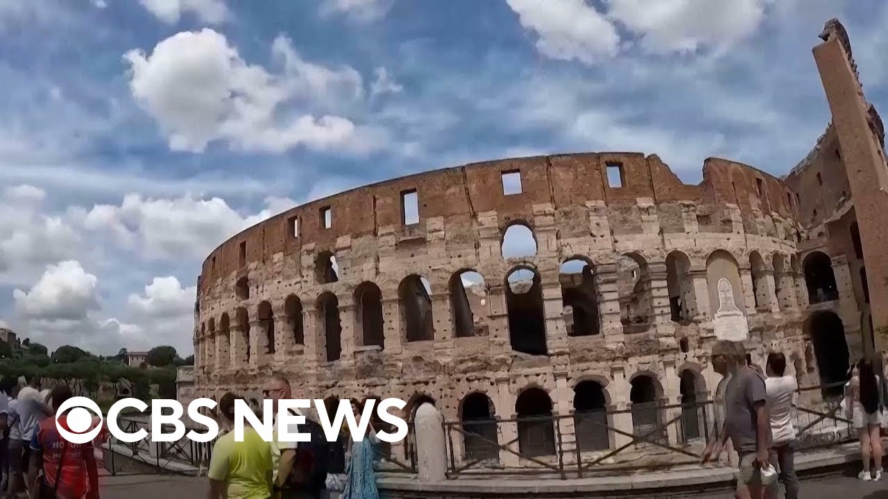 rome colosseum tourist carving
