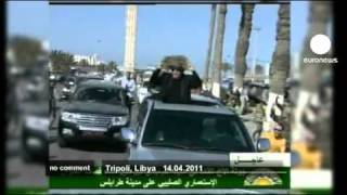 Gaddafi parades in his capital's streets