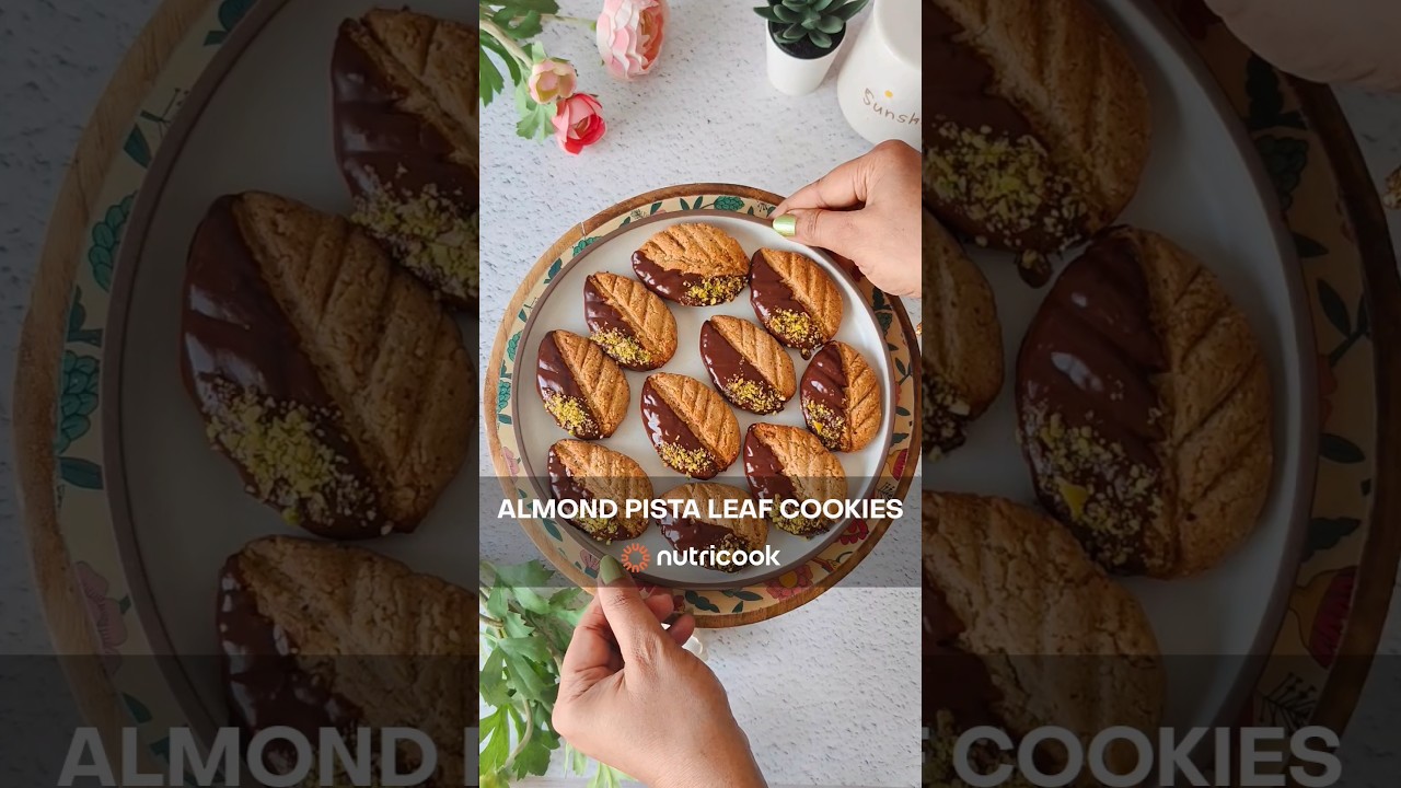 Almond Pista Leaf Cookies 🌿🍪 #cookies #almond #pista #chocolate  @Nutricook #youtubeshorts