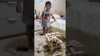 Building demolition by a kid