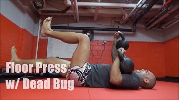 Floor Press w/ Dead Bug. Exercises for Muay Thai