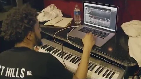 J. Cole Making Beat On His Tour Bus