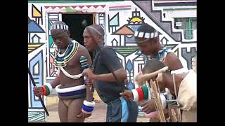 Ndebele culture - traditional male dancers postulating