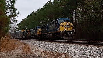 CSX 552 leads Q580-15 w/ 2 Dash 8