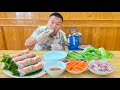 Cutis mukbang meat salad rolls served with vegetables and fruits
