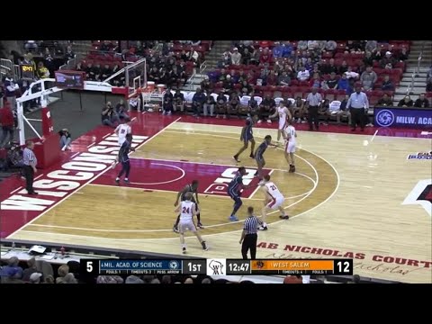 Milwaukee Academy of Science's Amare Jackson goes for a dunk