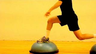 Plyometric split-squat scissor jumps on two BOSU
