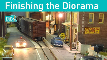 119 - Adding realistic details. Road Signs, figures, fences and more.